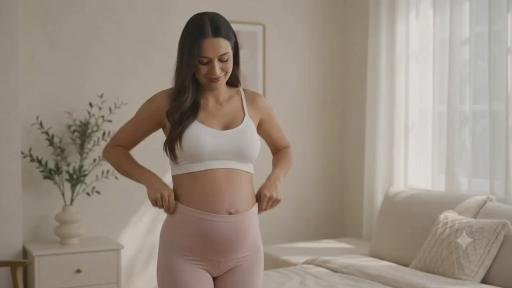 Load video: Pregnant woman wearing Nurtura maternity support shorts while walking comfortably.